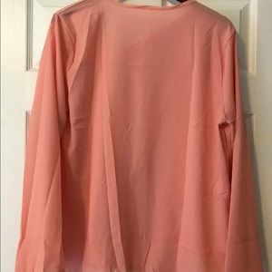 Coral colored shirt
